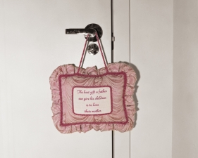 Gillian Laub<br /> <em>Mom's Pillow (The Best Gift), NY, 2004</em><br /> <em>From Family Rename Series, 2007</em><br /> Chromogenic prints<br /> 24 x 20" &nbsp; &nbsp;Edition of 8<br /> 40 x 30" &nbsp; &nbsp;Edition of 5<br /> 50 x 40" &nbsp; &nbsp;Edition of 3